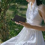 Flip Πορτοφόλι από Συνθετικό Δέρμα (PU) με TPU για OnePlus Nord 6 5G σε Μαύρο χρώμα με θήκες καρτών, stand και λουράκι καρπού.
